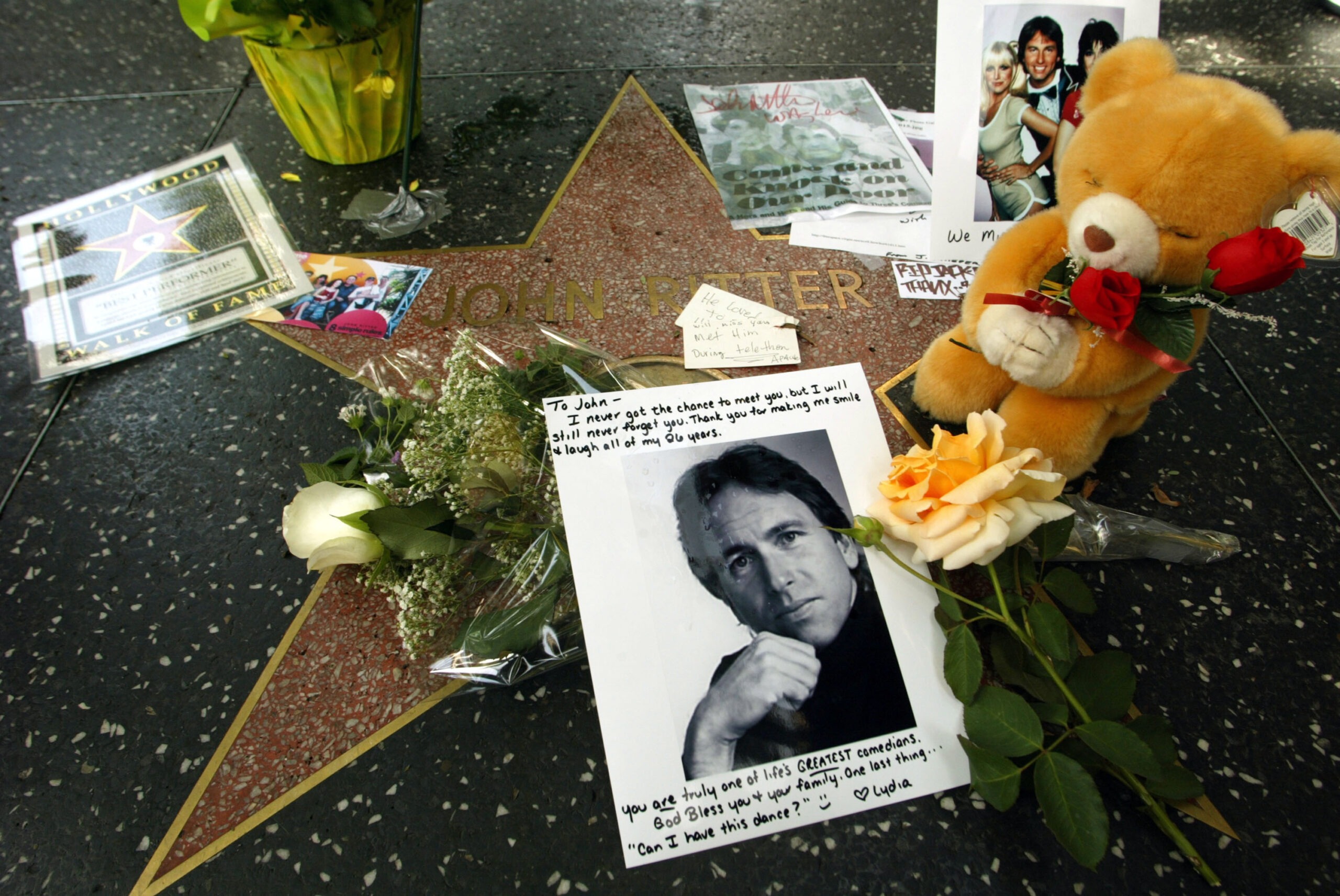 John Ritter's star on the Hollywood Walk of Fame memorialized with flowers and gifts by fans | Source: Getty Images