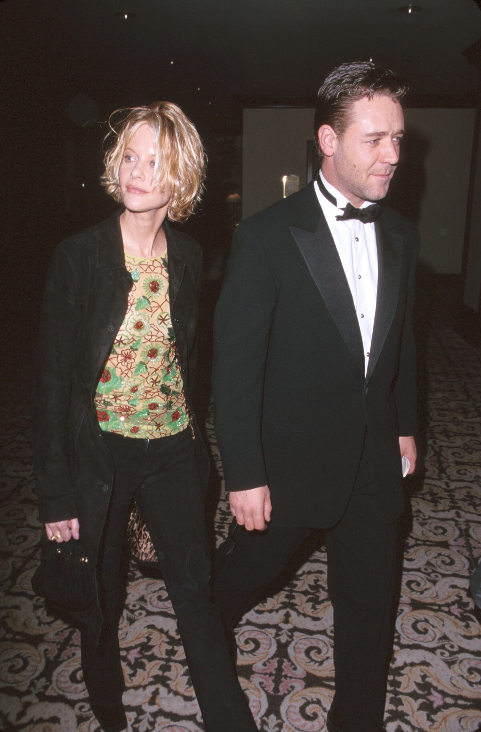 Meg Ryan and actor Russell Crowe pictured attend the 52nd Annual Directors Guild Awards at Century Plaza Hotel on March 11, 2000 Century City, California | Source: Getty Images