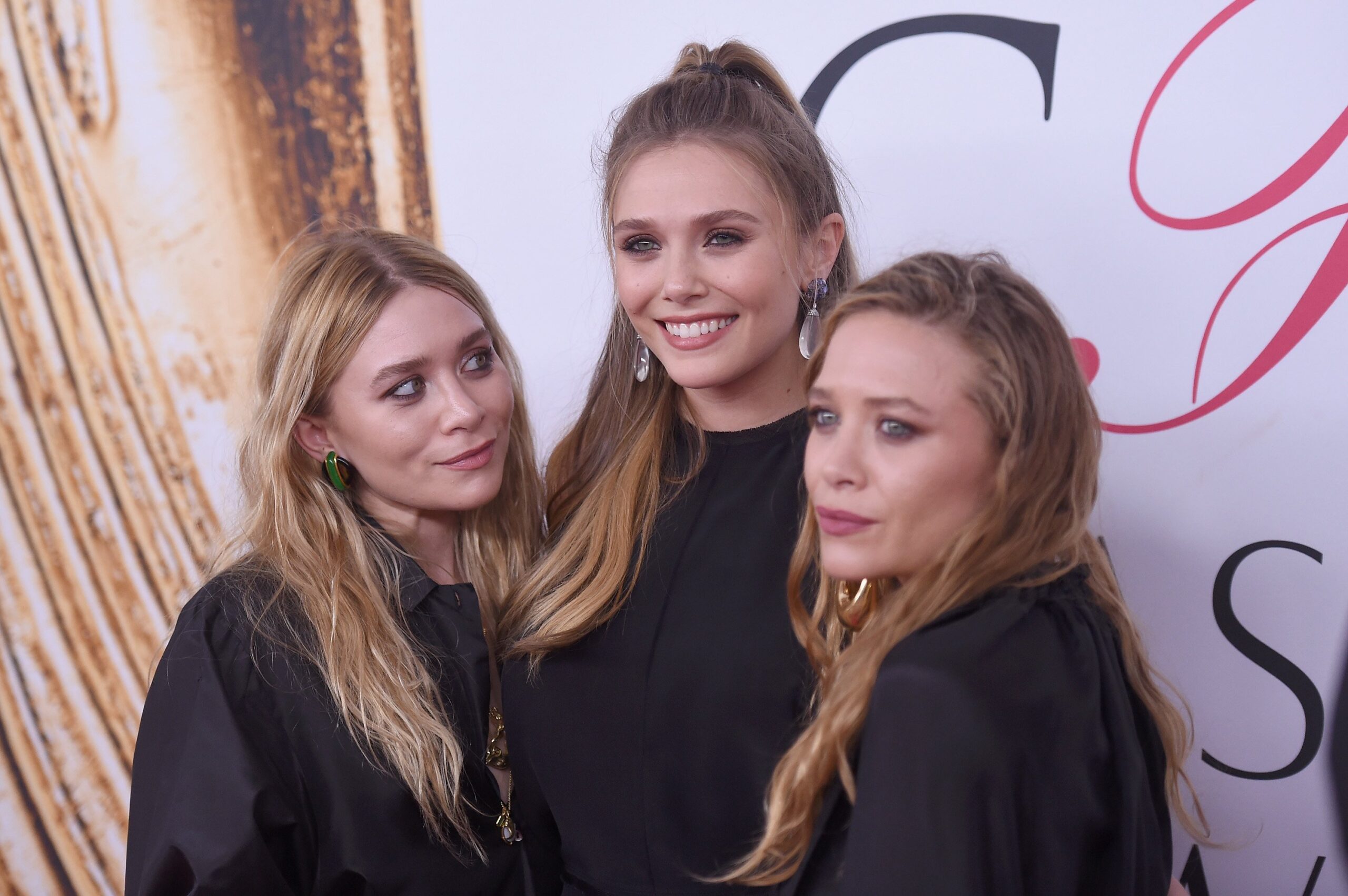 Elizabeth, Mary-Kate, and Ashley Olsen at the 2016 CFDA Fashion Awards on June 6, 2016, in New York City | Source: Getty Images