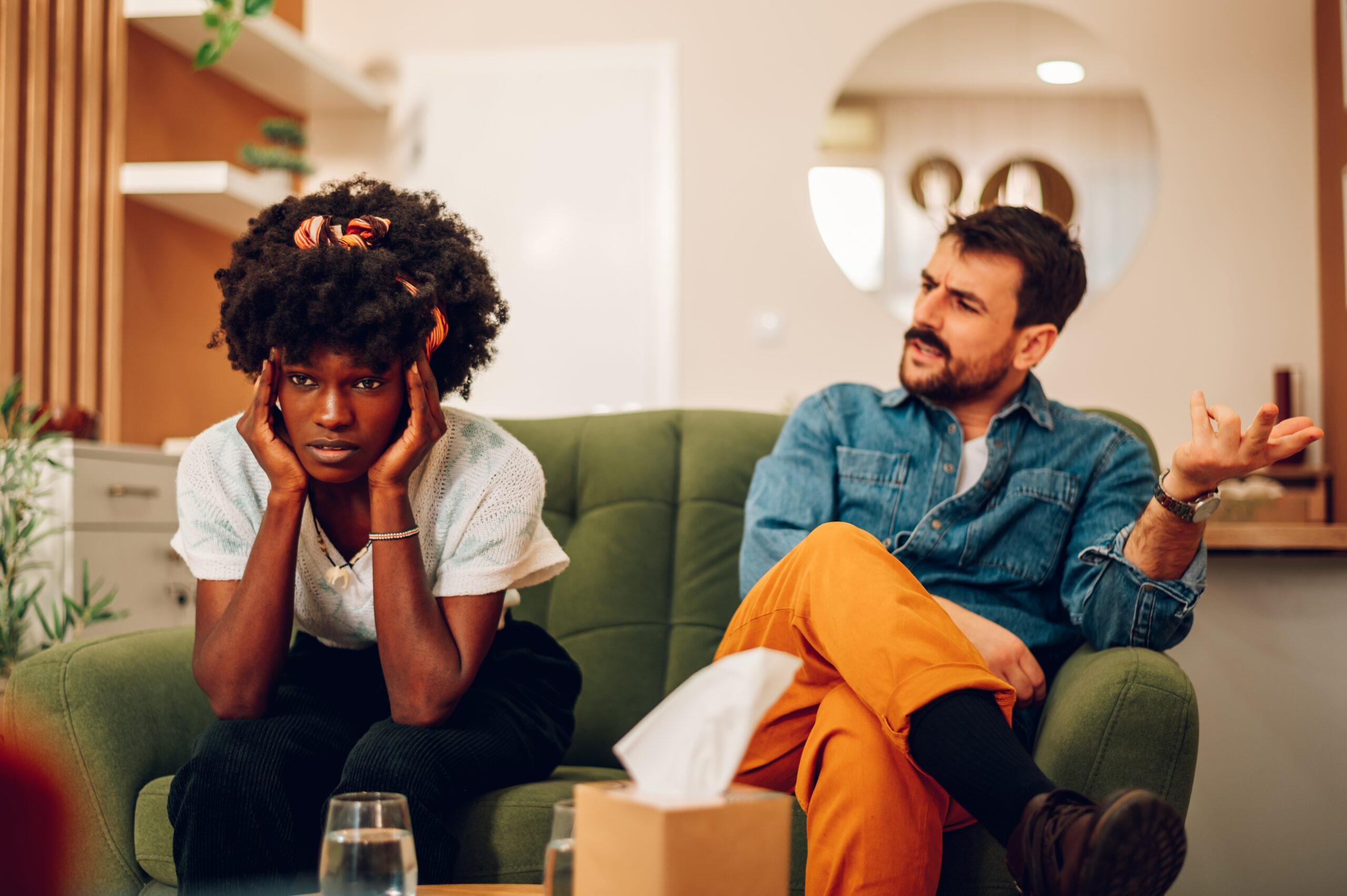 A mixed-race couple arguing | Source: Shutterstock