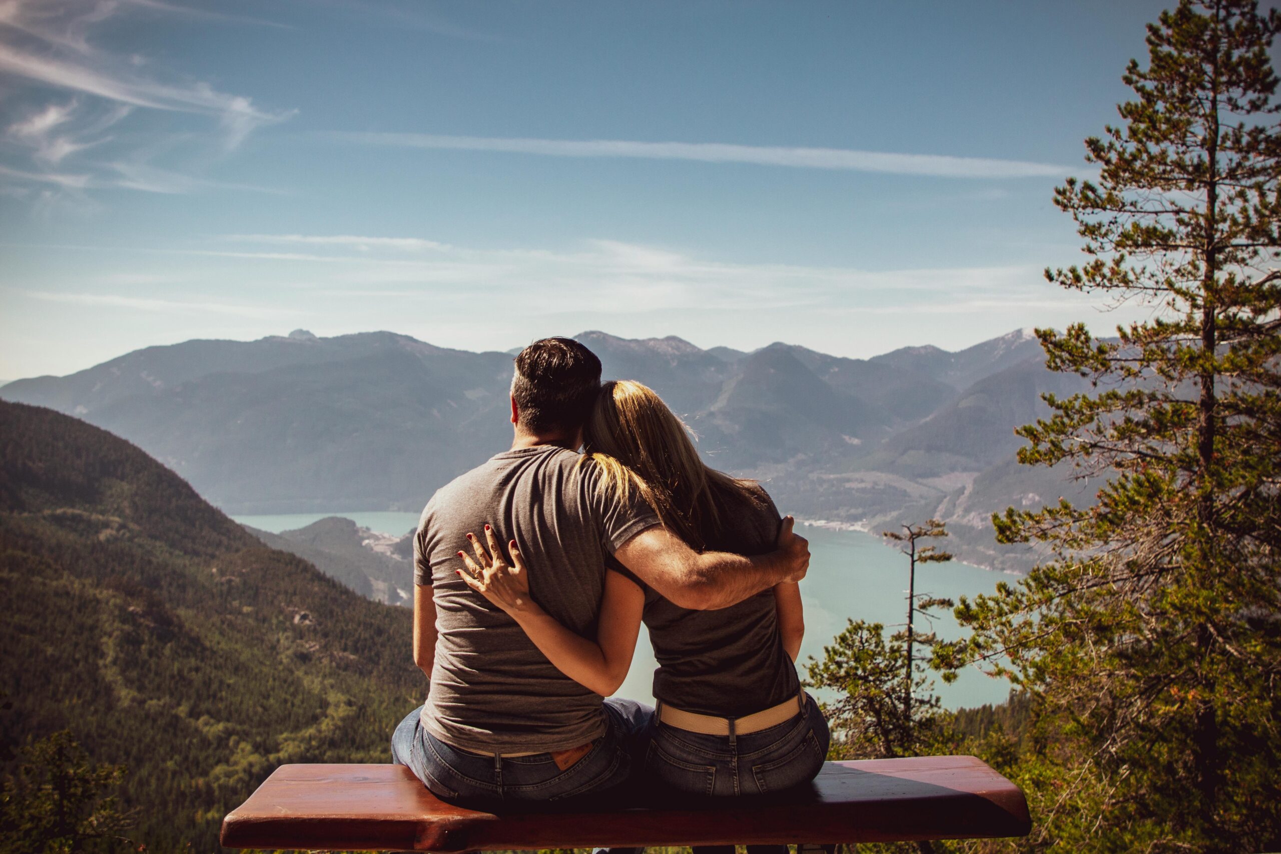 A couple with their backs turned away, looking at a stunning view | Source: Pexels